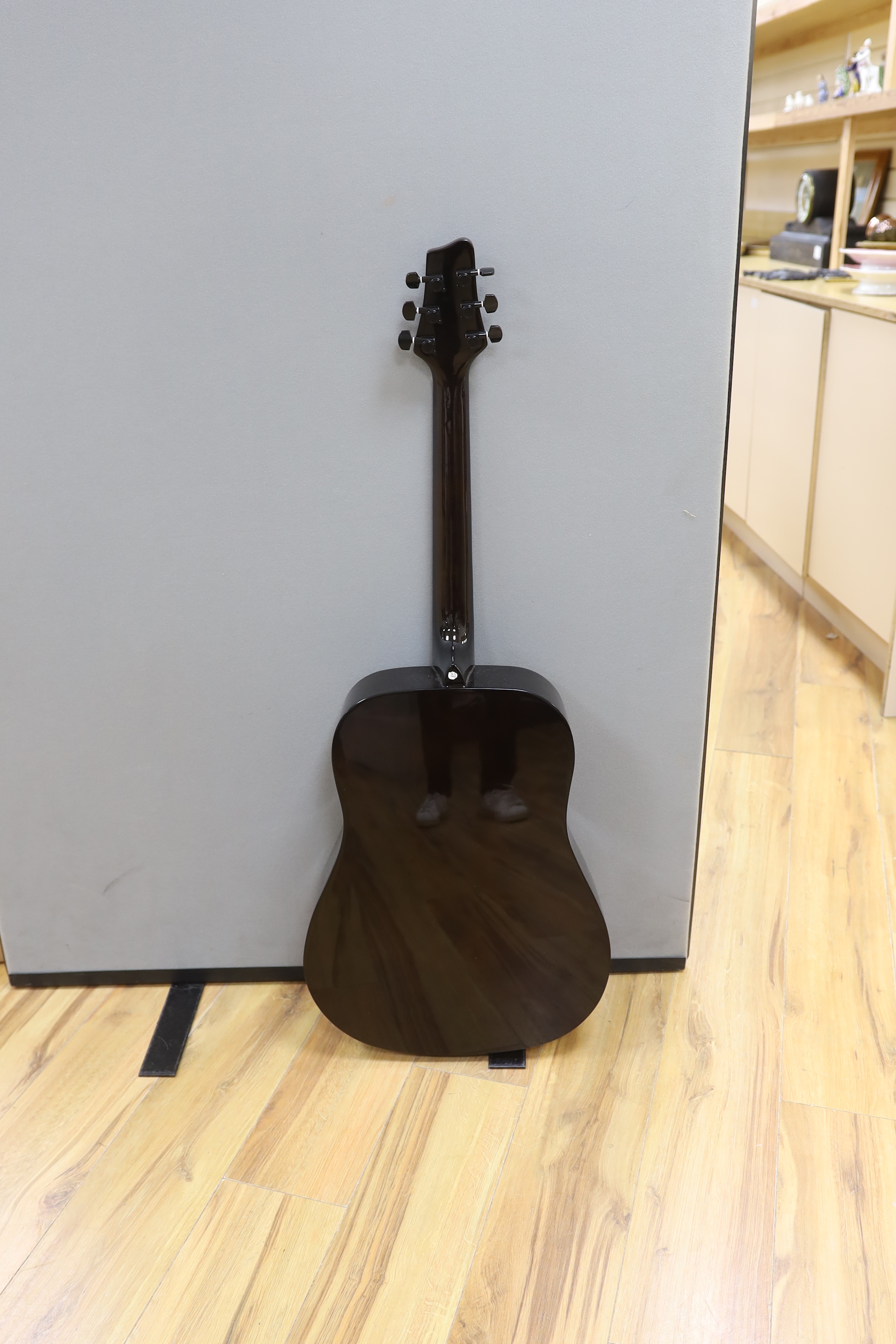 A Rockwood acoustic guitar, in case